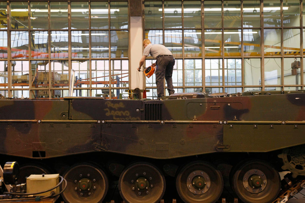 Man building a tank