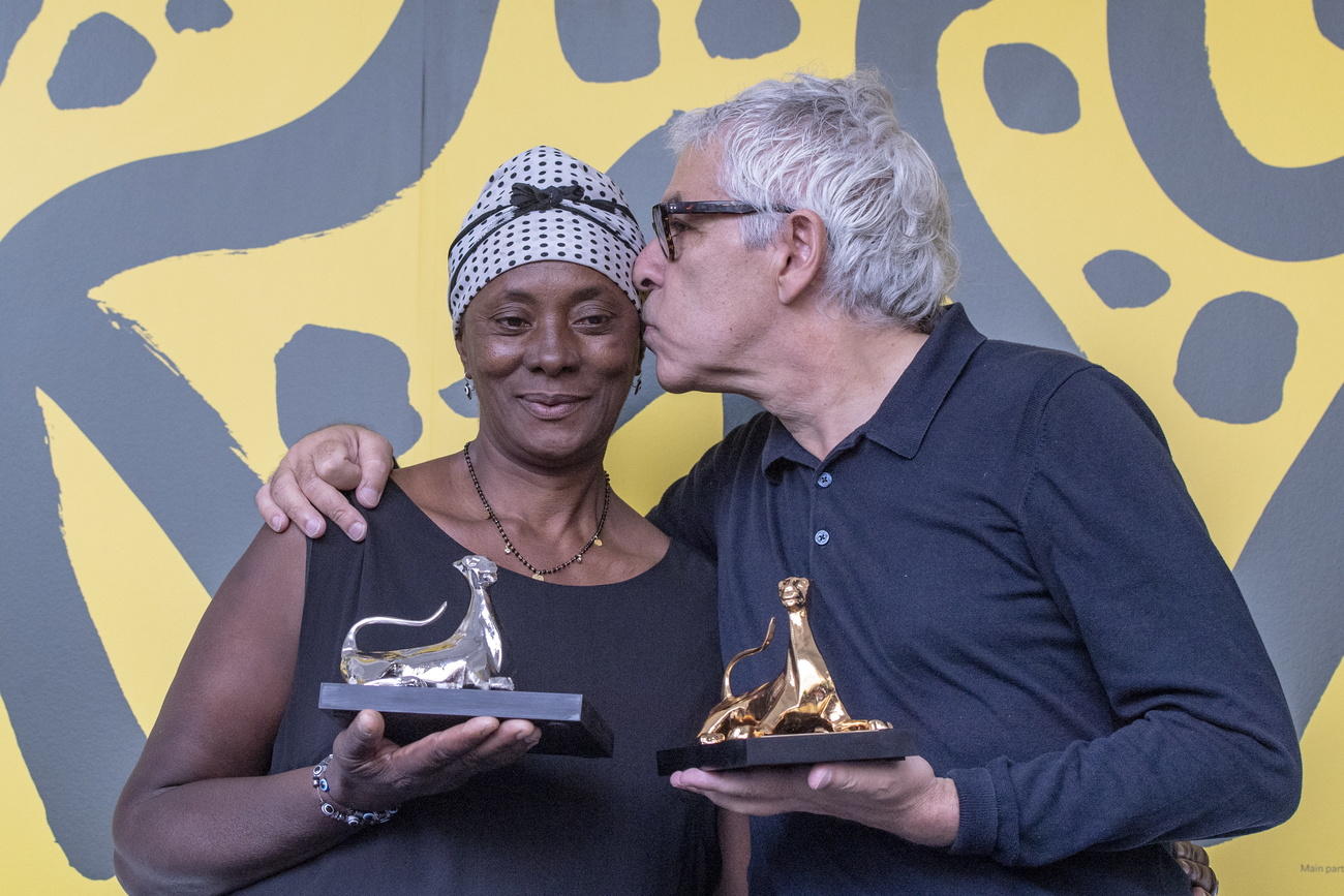 Director Pedro Costa and actress Vitalina Varela with their Golden Leopard awards