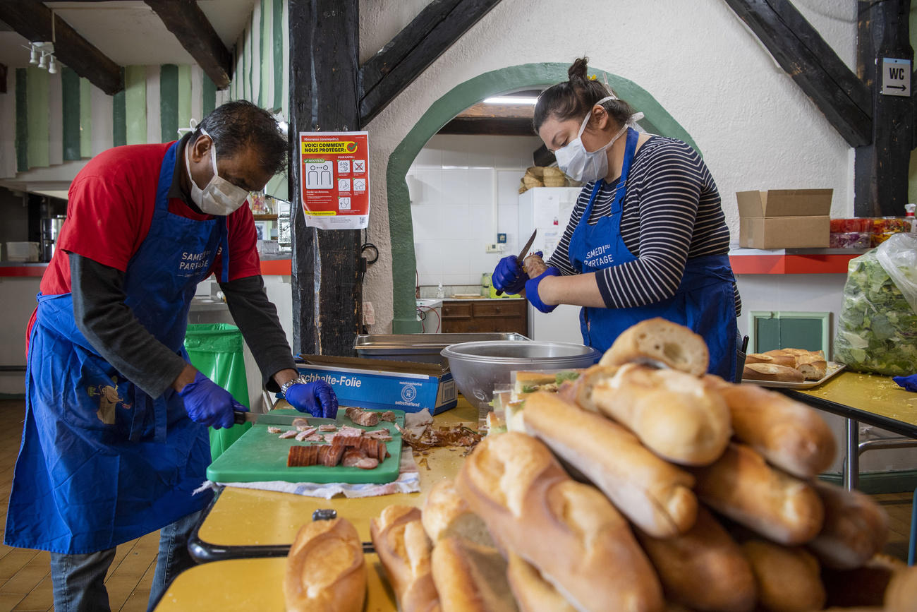 Volunteers preparing sandwiches