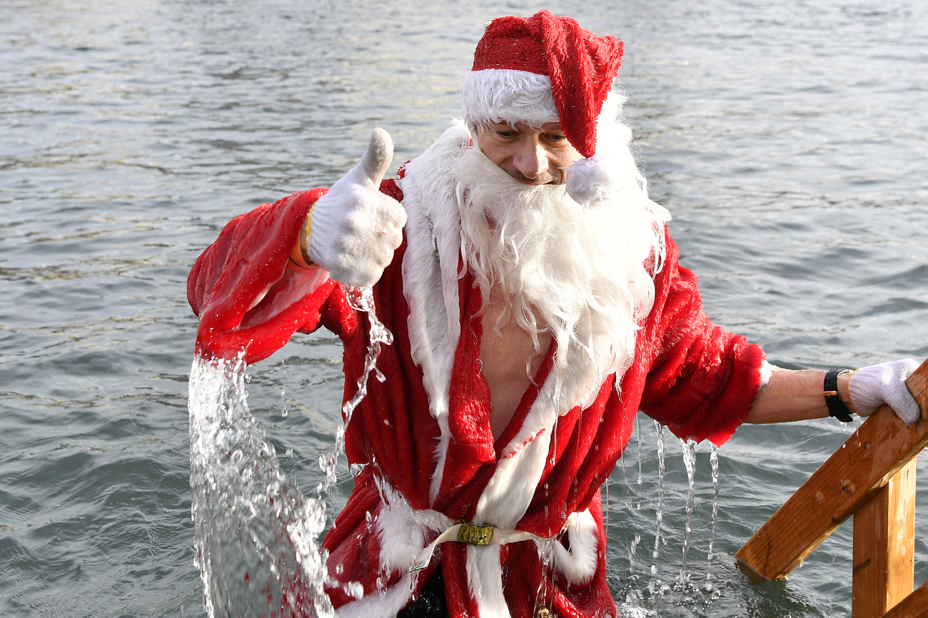 Father Christmas in a lake