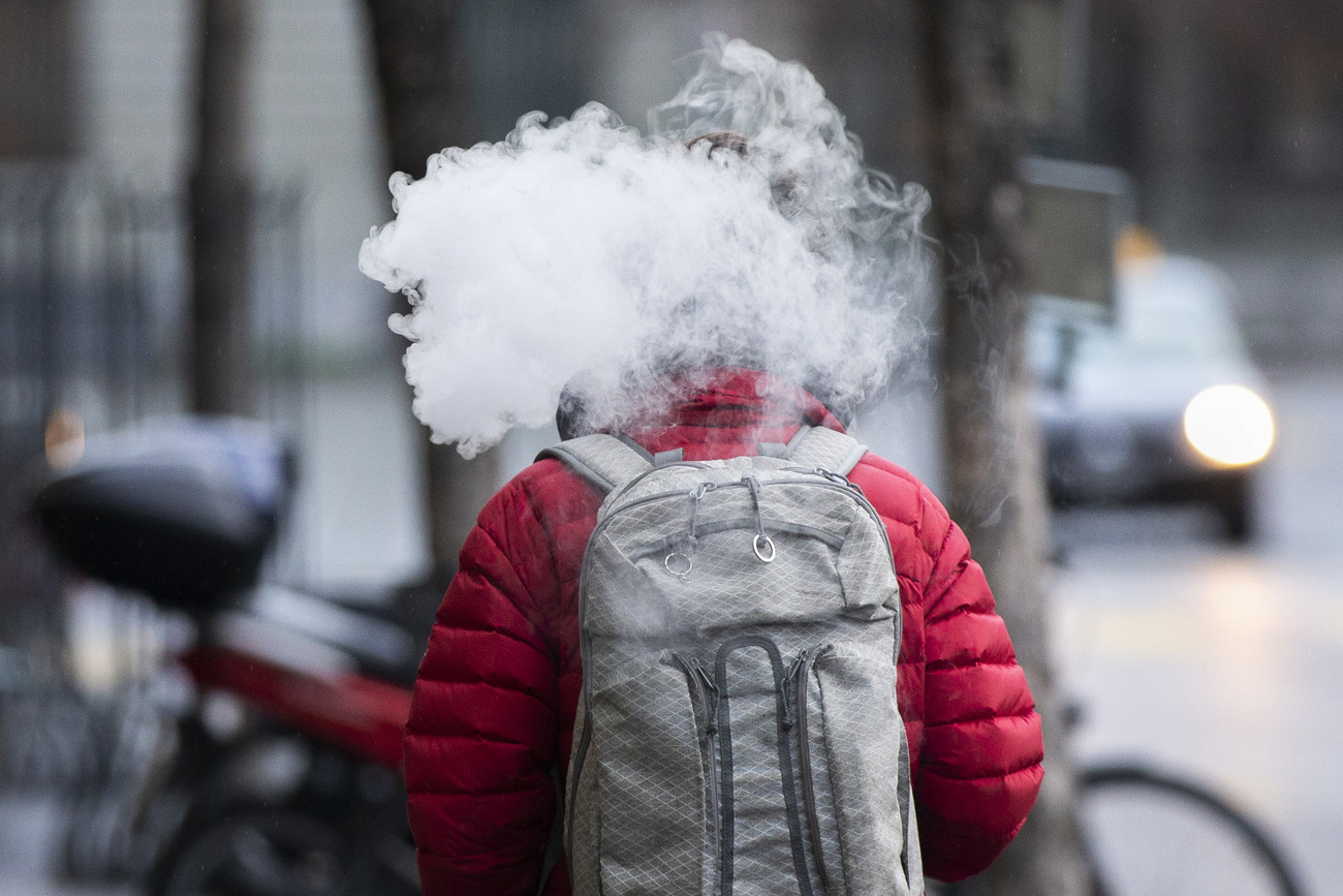 Person in cloud of smoke