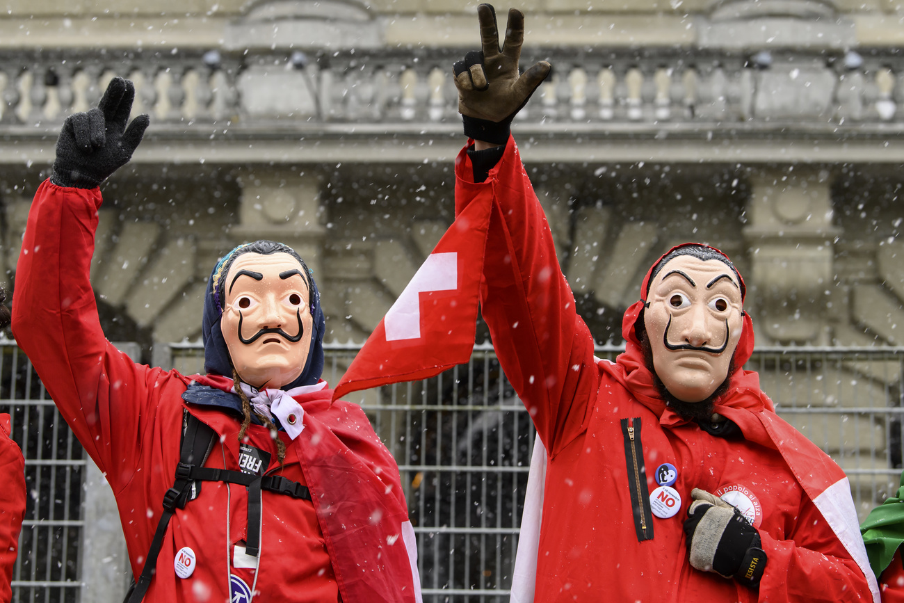 Covid protesters outside the Swiss parliament building in Bern on November 28, 2021