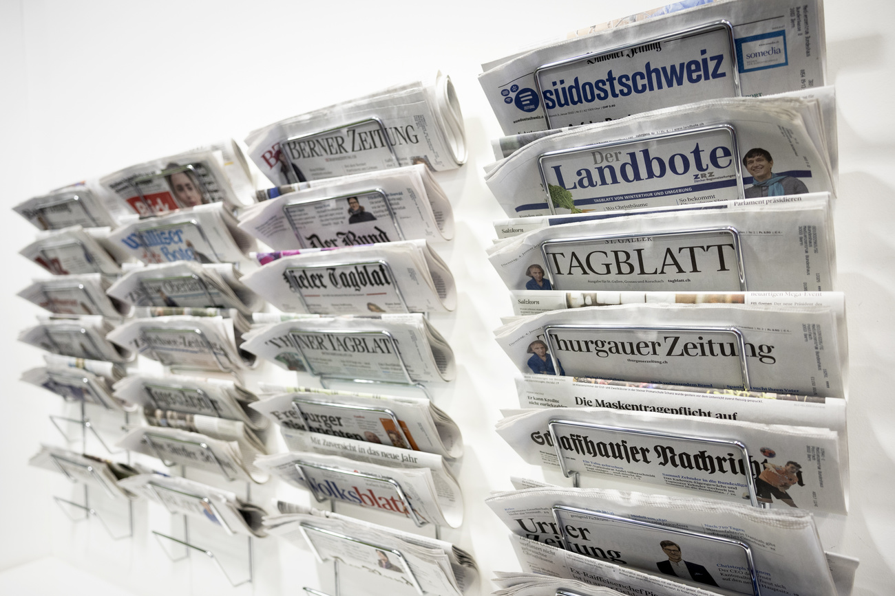 swiss newspapers in racks