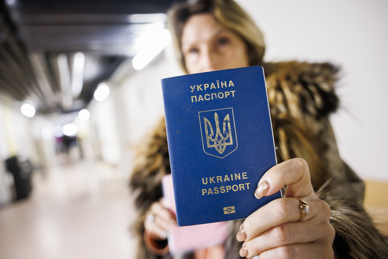 Ukrainian woman with passport.