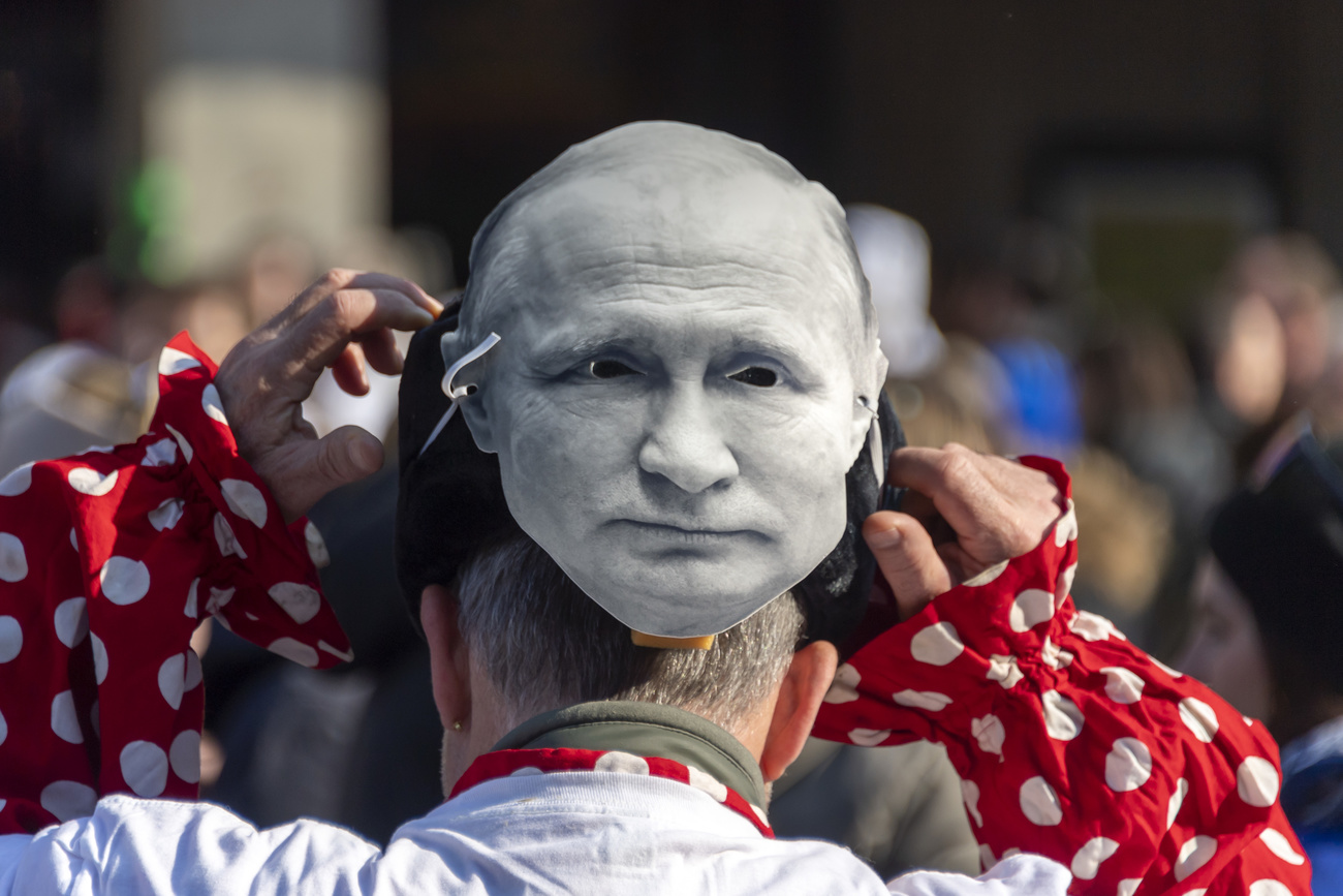 man wearing putin mask