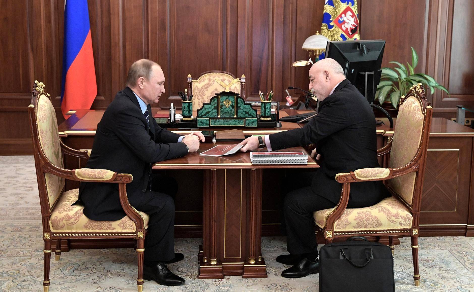 Russian President Vladimir Putin meets with Viktor Vekselberg