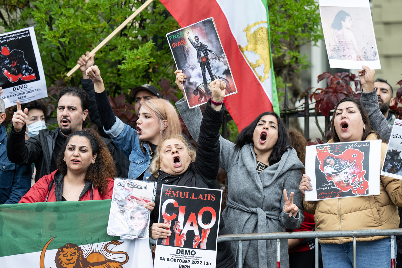 Demonstrators protest outside the Iranian embassy in Bern