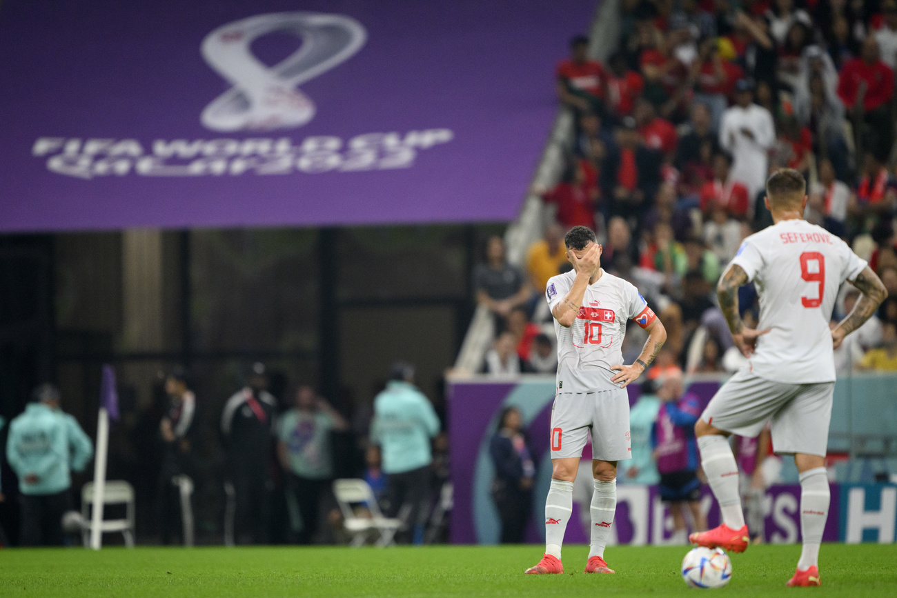 Swiss footballers look miserable after World Cup defeat against Portugal