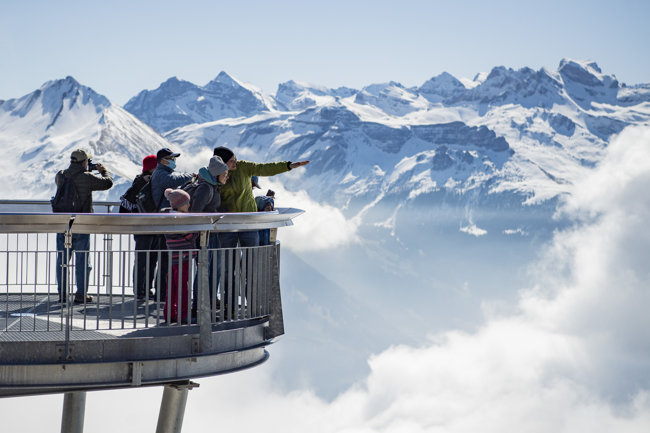 People looking at a mountain