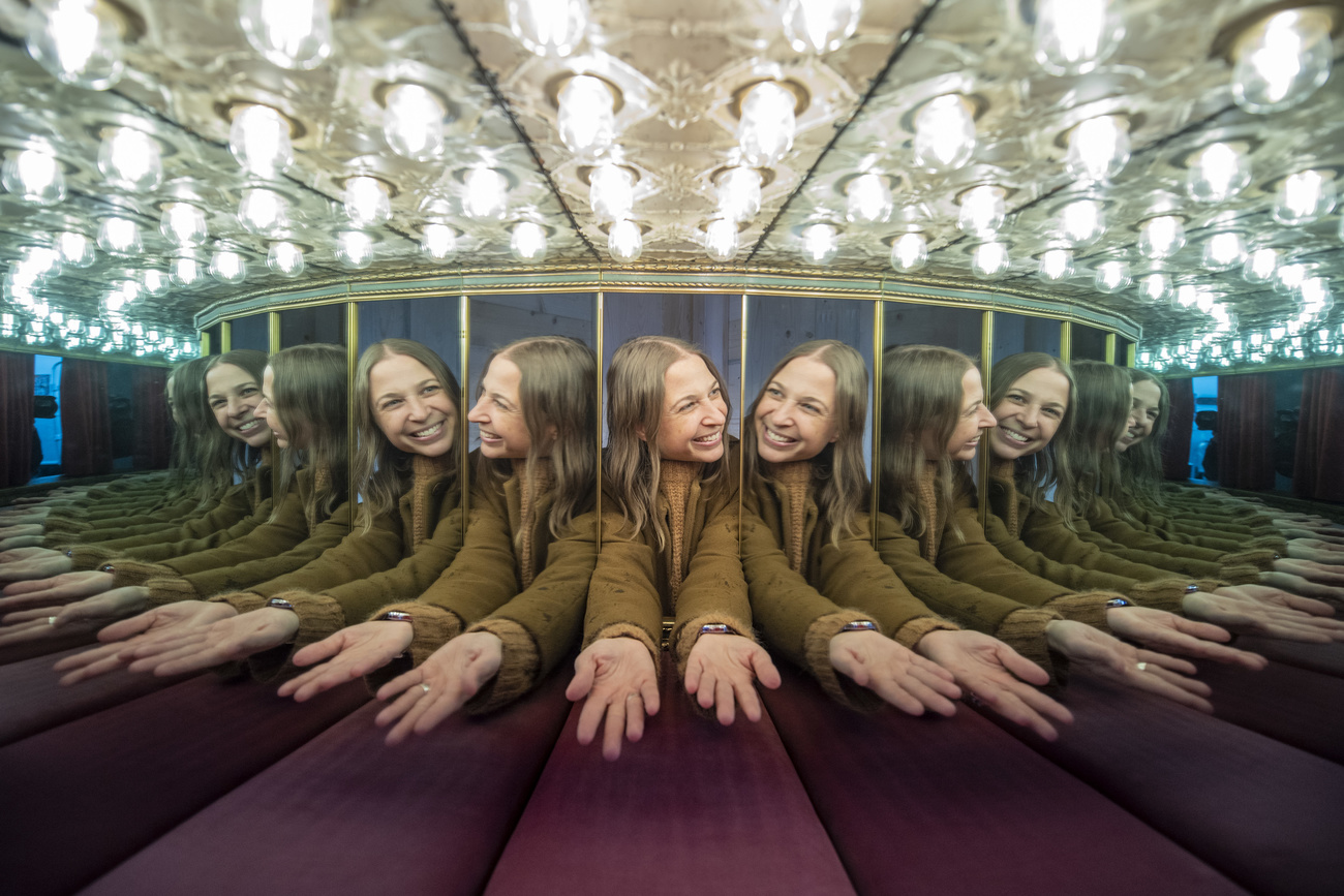 Girl in hall of mirrors