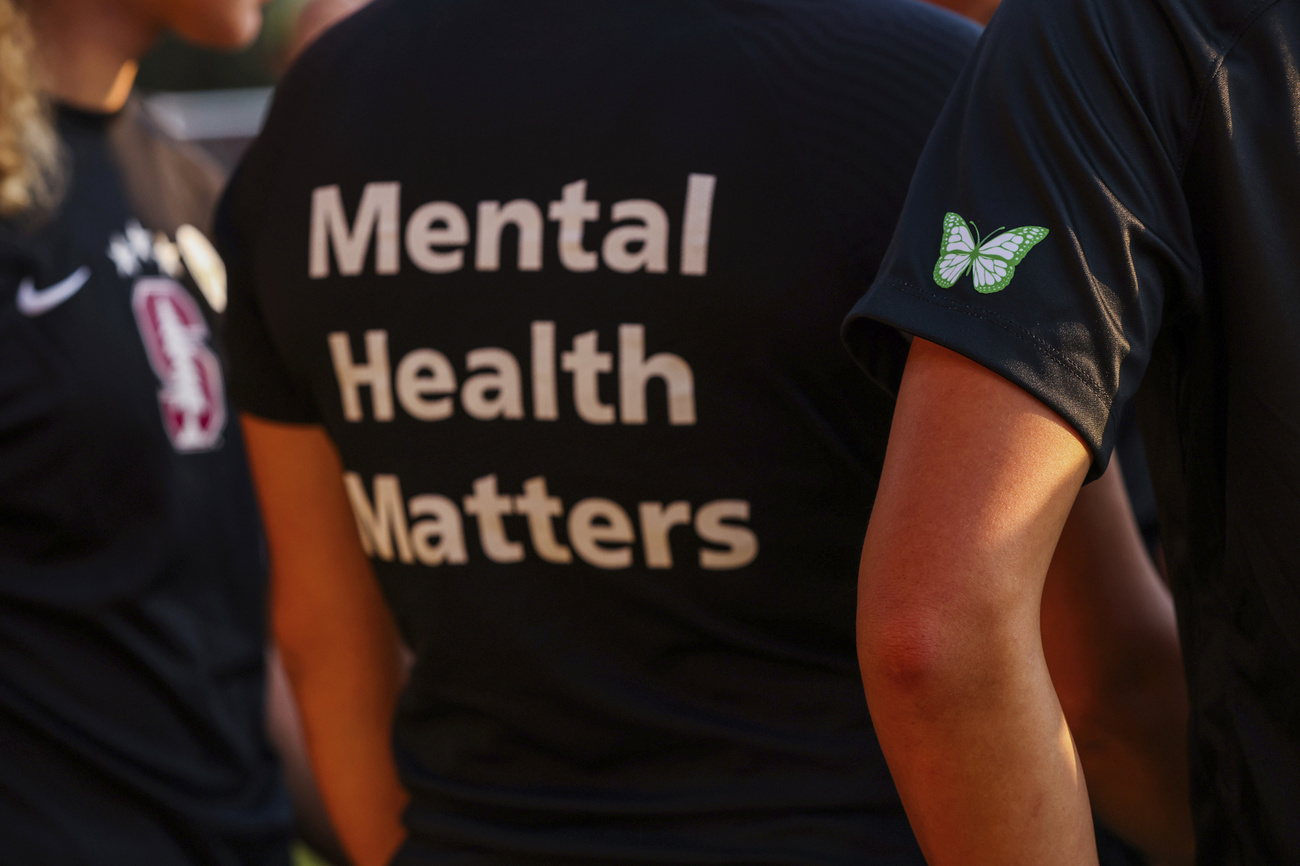 The back side of a t-shirt with the saying Mental health matters printed on it