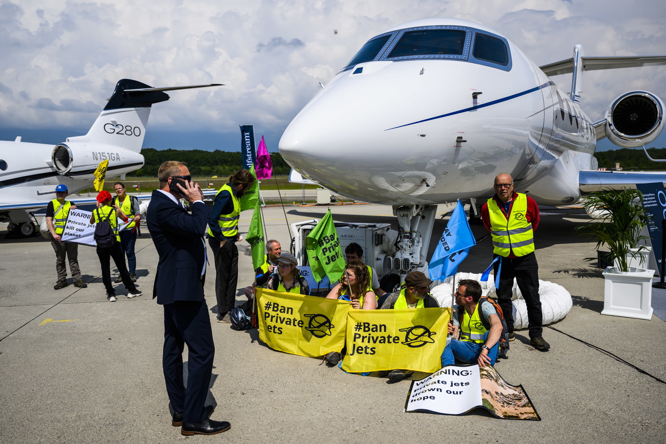 Protest against private jets at Geneva Airport.