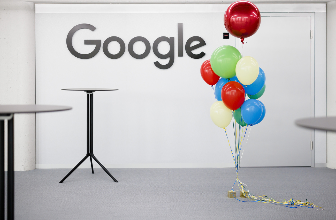 balloons in front of the google logo