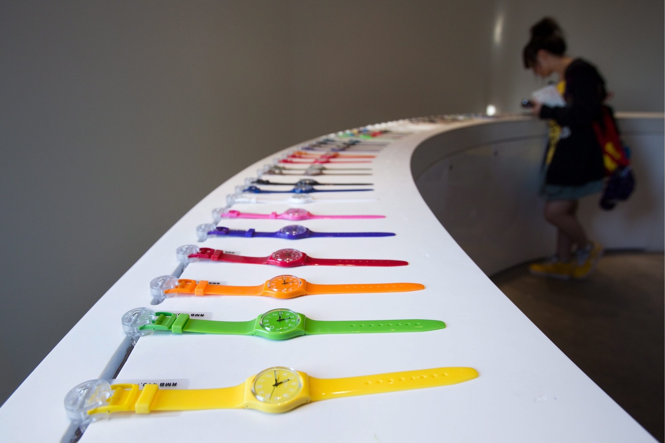 row of brightly coloured swatch watches