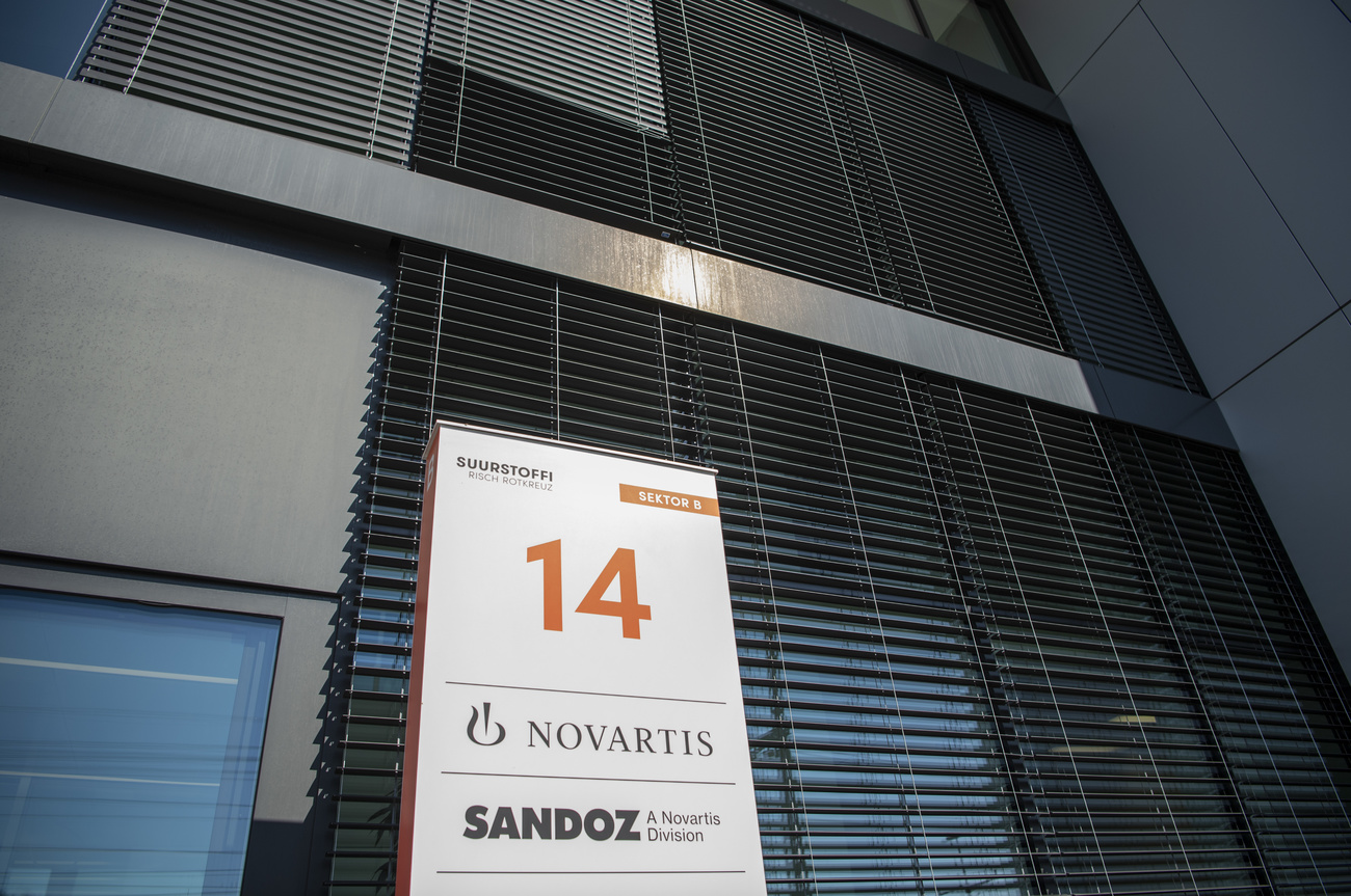 Picture of a building with sign saying Sandoz and Novartis