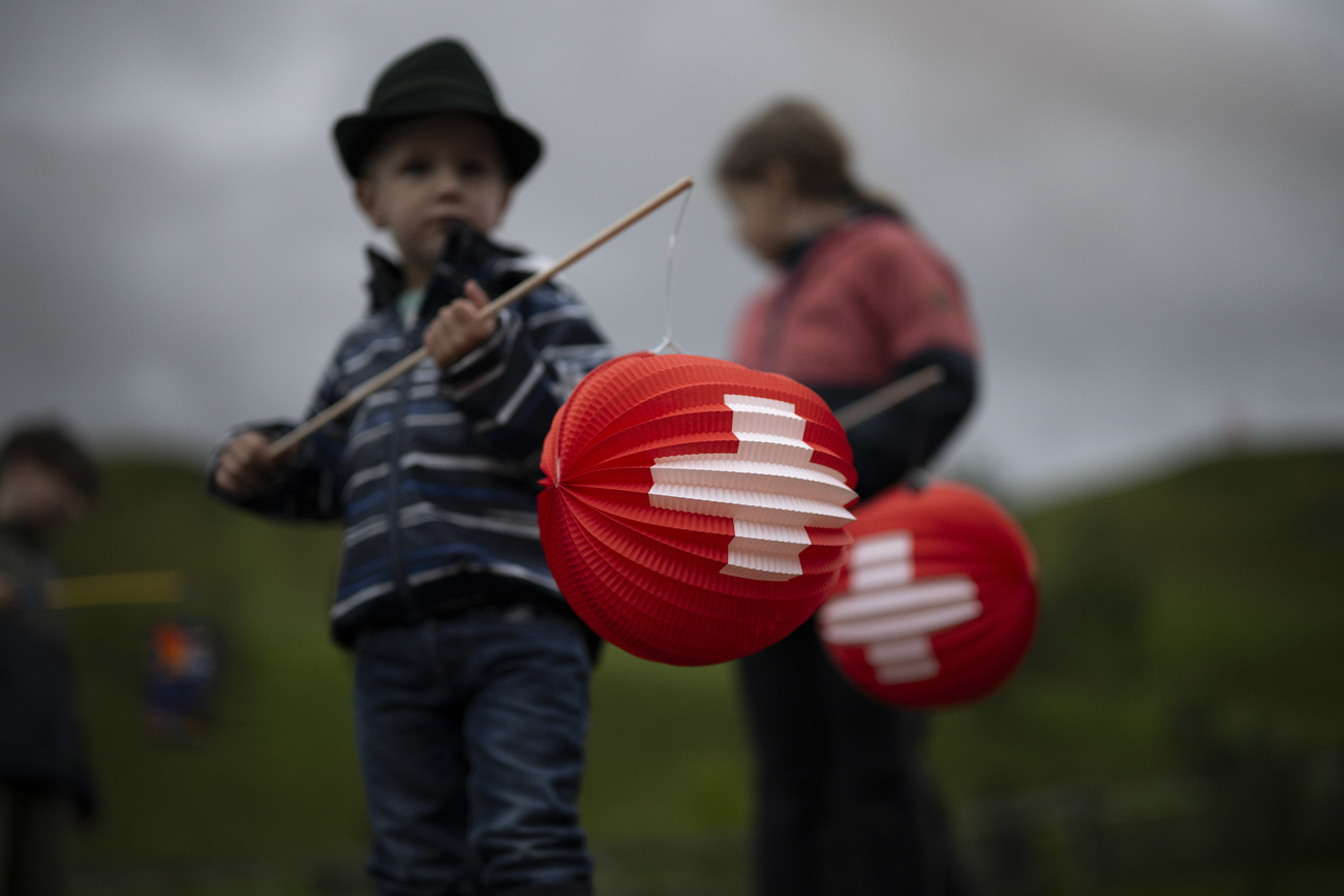 Child with Swiss lantern