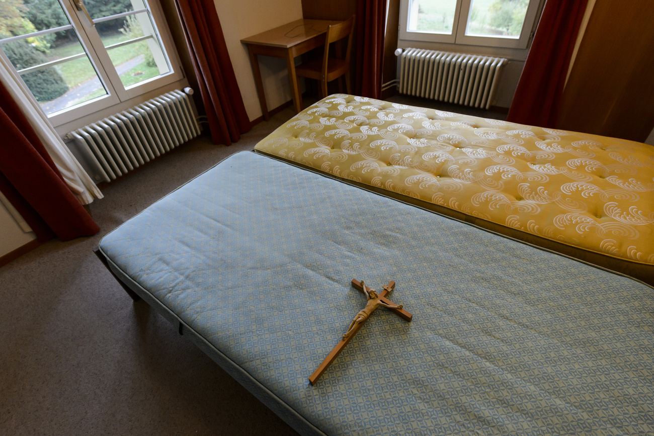 crucifix on bed