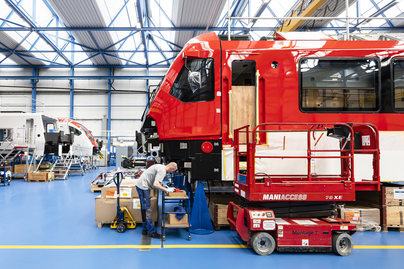 Stadler Rail employee and train wagon