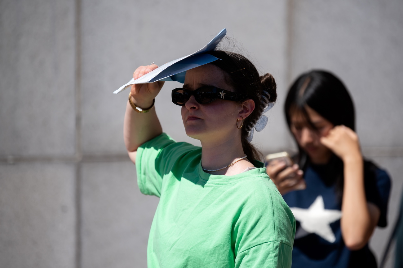 People protect themselves from heat