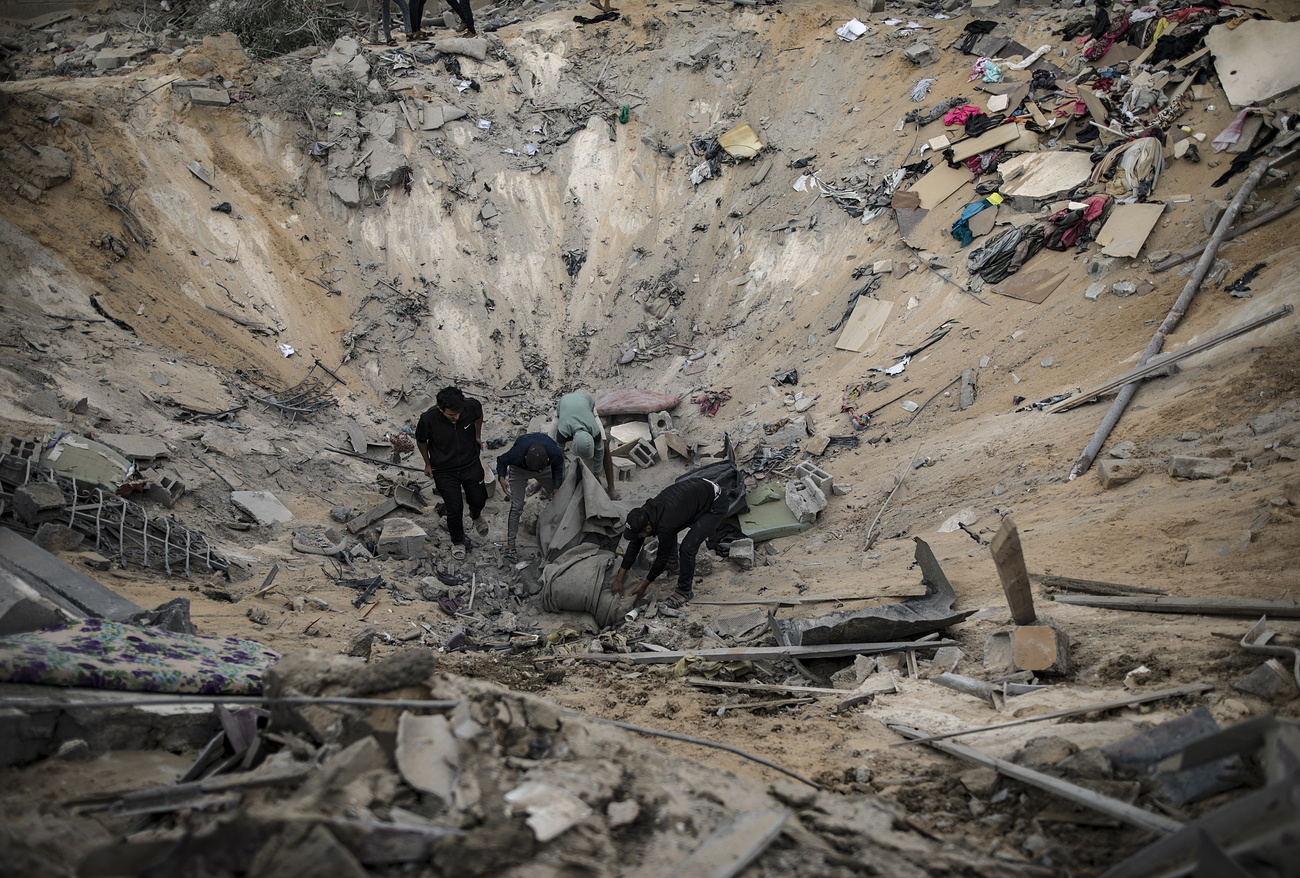 Crater caused by bomb in southern Gaza Strip.