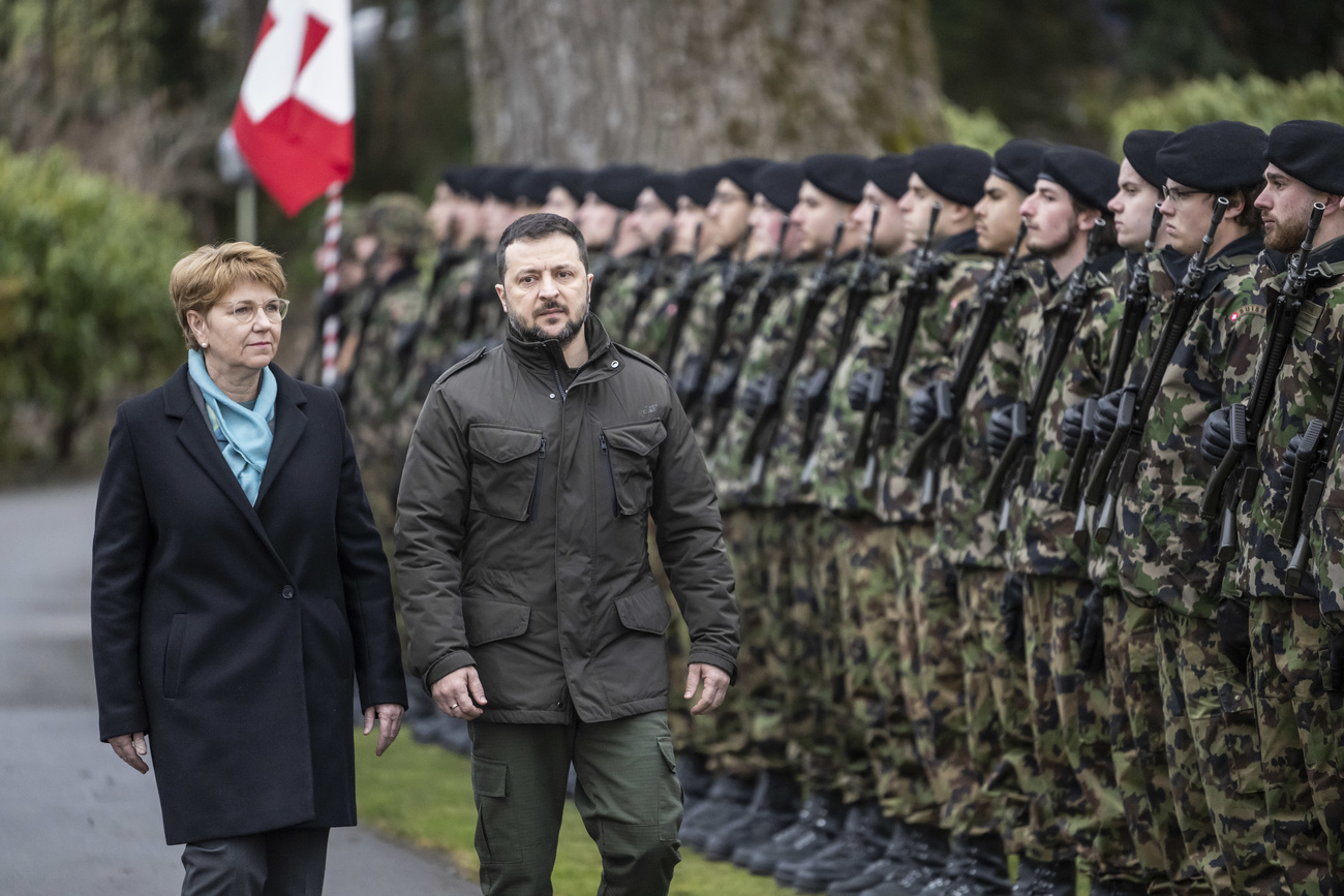 amherd and zelensky and a line of soldiers