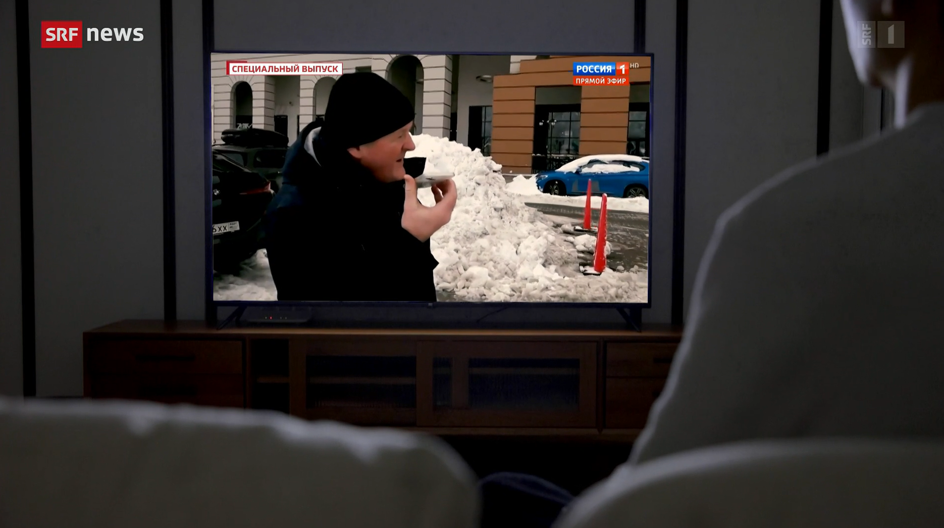 tv picture of man with snow