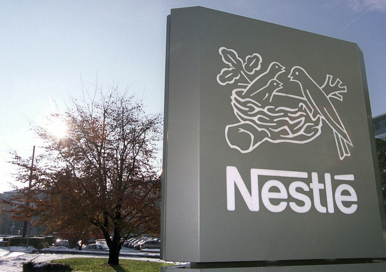 The Nestle company name and logo on a sign outside of the company's headquarters.