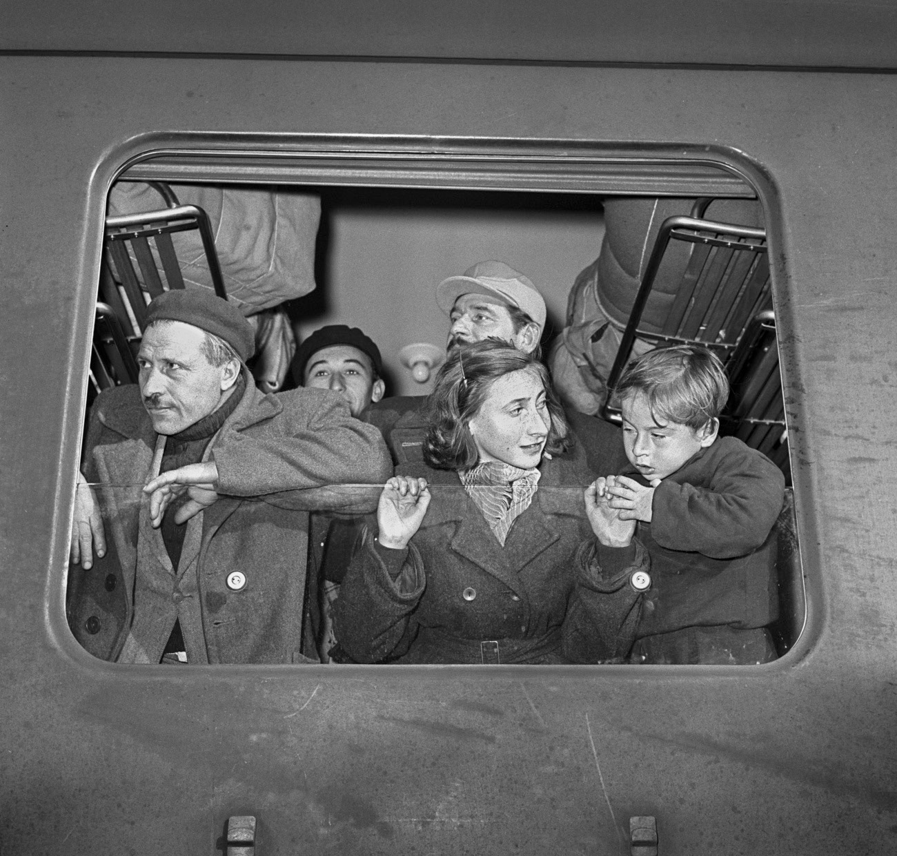 The first Hungarian refugees of the Hungarian Revolution arrive at the border station in Buchs, Switzerland, on November 8, 1956.