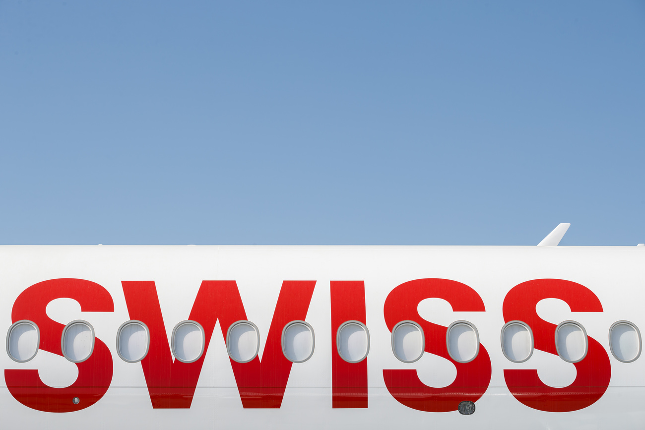 The Swiss International Air Lines logo is shown on the side of a plane.