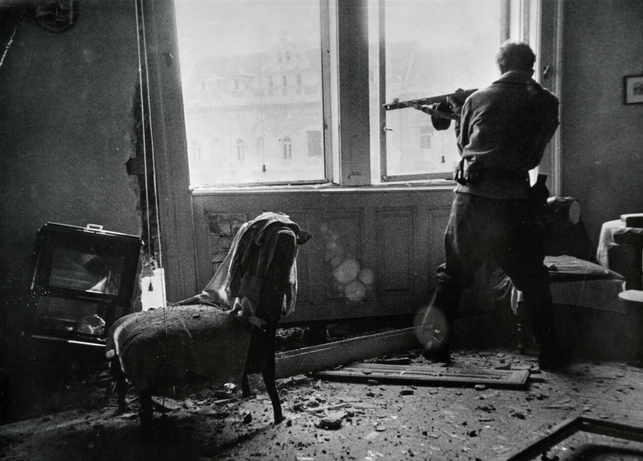 Hungarian shooting from home on the street, Budapest, Hungary 1956.