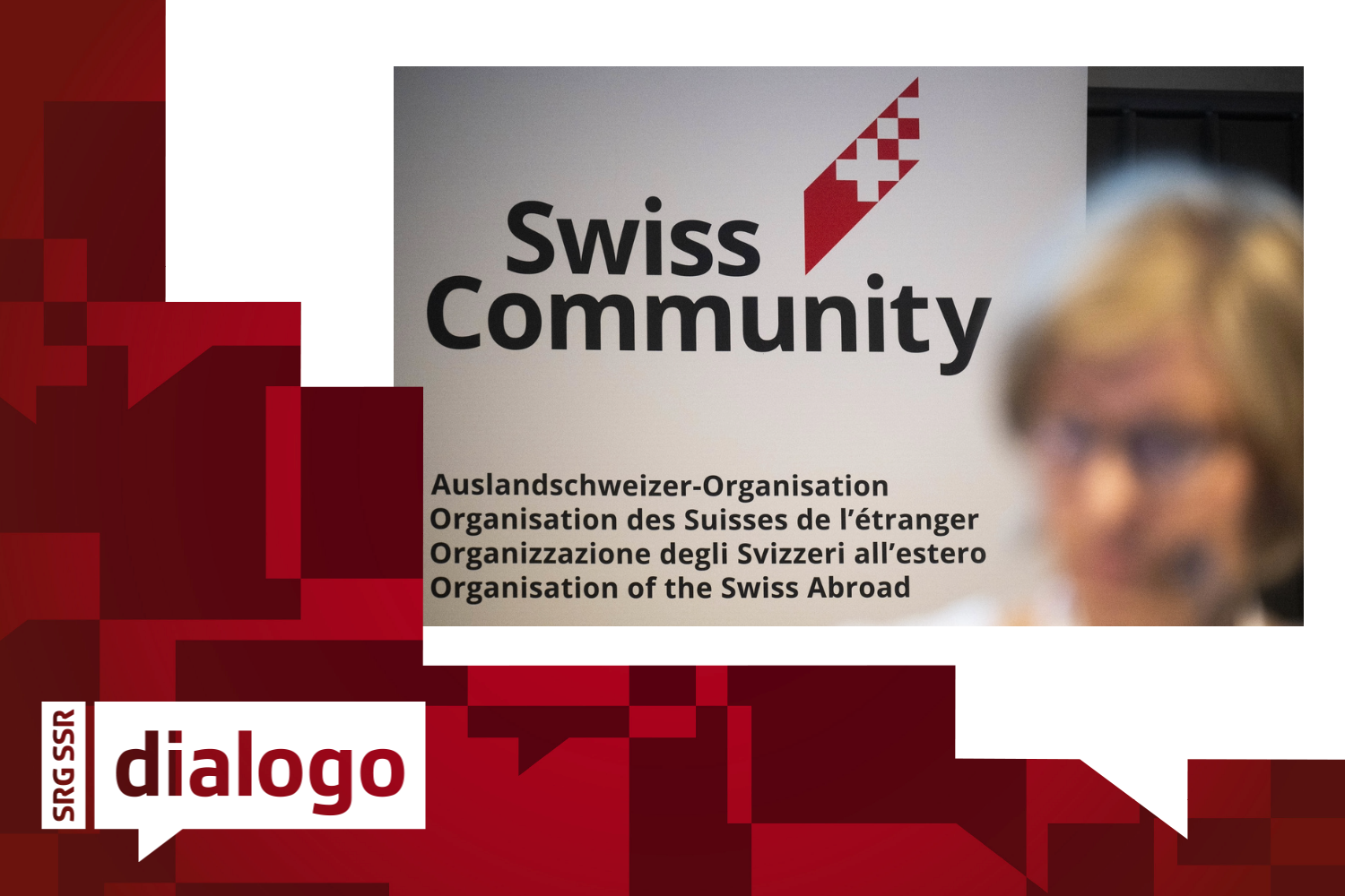 Logo di "Swiss-Community" nel Consiglio degli Svizzeri all'estero su uno striscione.