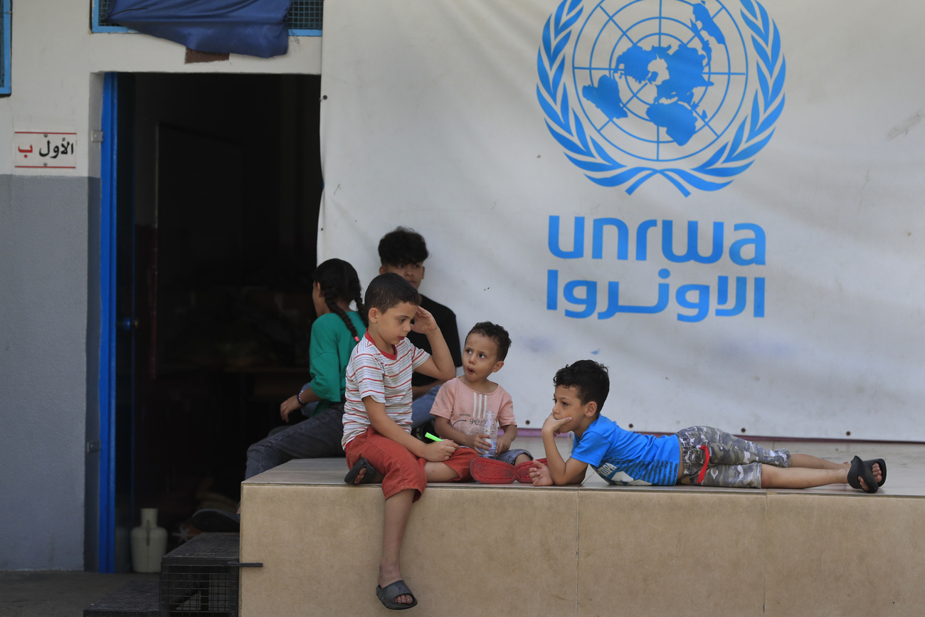 Palestinian children who fled with their parents from their houses in the Palestinian refugee camp of Ein el-Hilweh, gather in the backyard of an UNRWA (United Nations Relief and Works Agency for Palestine Refugees in the Near East) school, in the southern port city of Sidon, Lebanon, Tuesday, September 12, 2023.
