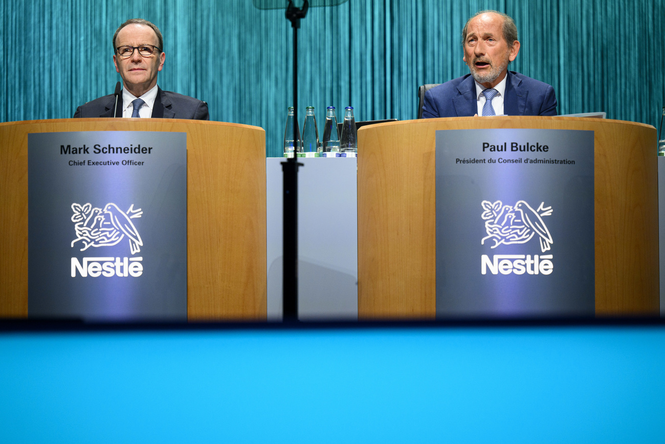 Nestlé CEO Mark Schneider (left) and Nestlé Chairman Paul Bulcke (right) speak during the Annual General Meeting of the world's largest food and beverage company Nestlé Group on April 18, 2024.