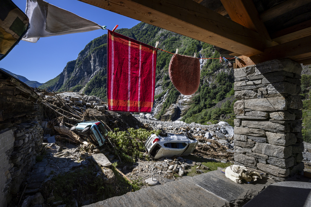 Rubble and cars in massive landslide is seen next in Fontana, in Val Bavona in the Maggia Valley, southern Switzerland on Thursday July 4, 2024. Severe storms and torrential rain over the last weekend left five people dead in Switzerland's Val Maggia and its side valleys in Ticino.