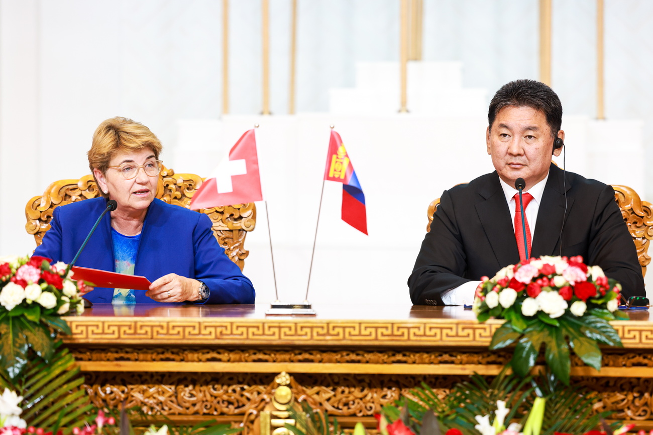 Swiss President Viola Amherd (left) speaks as Mongolian President Ukhnaagiin Khurelsukh (right) looks on during a signing ceremony in Ulaanbaatar, Mongolia, August 2, 2024.