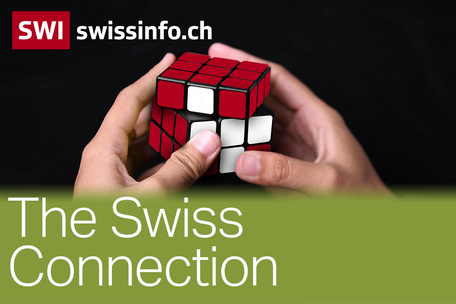 The Swiss Connection, two hands are holding rubiccube