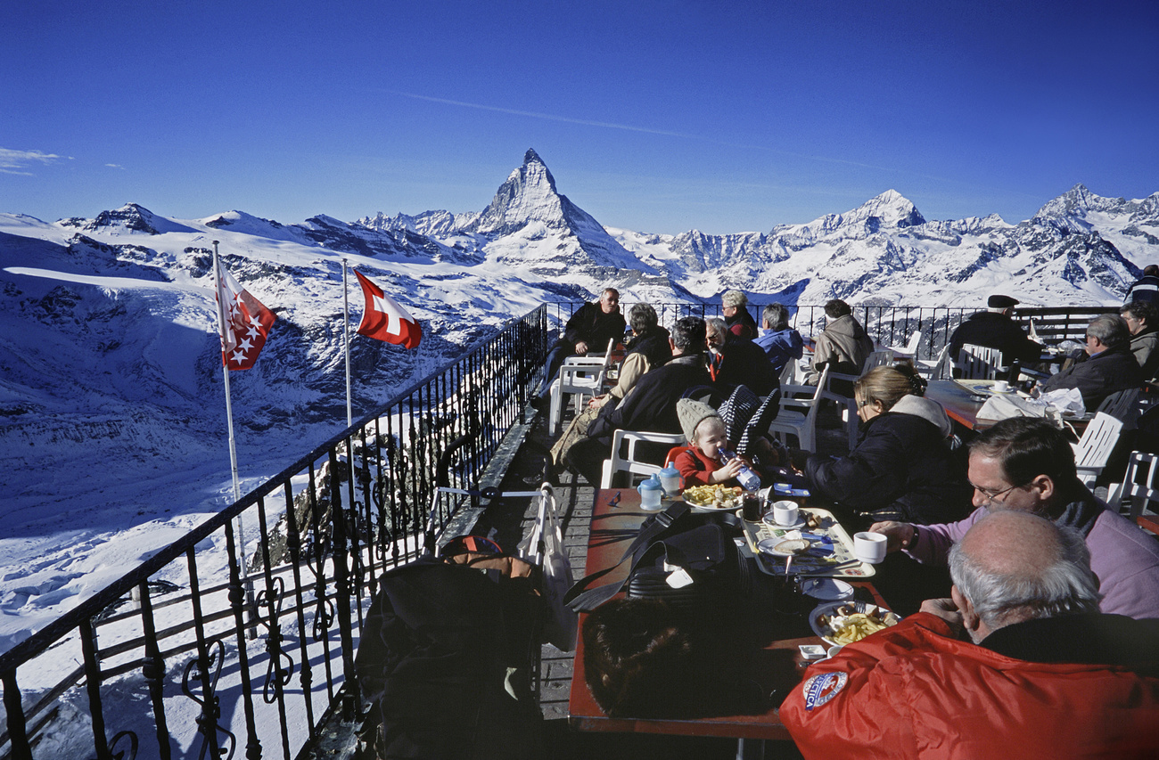 Tourists enjoy the view of the Matterhorn in Switzerland