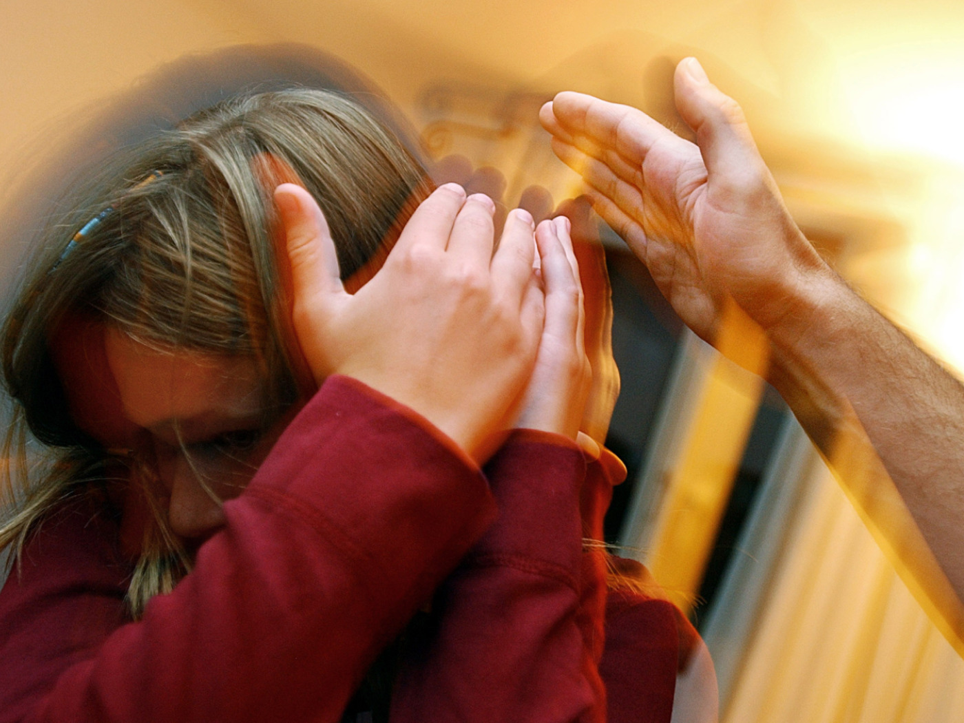 Staged photo of child being hit