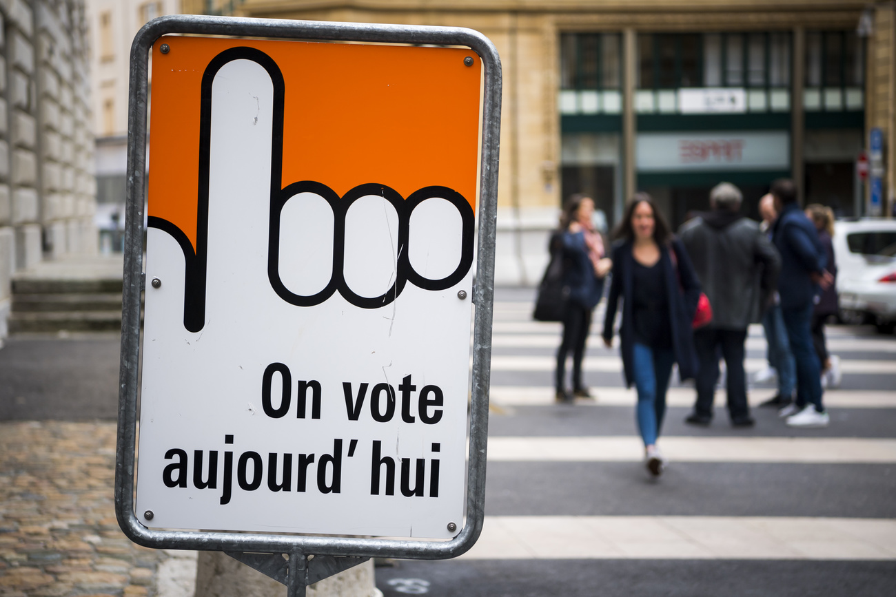 Affiche indiquant la direction d'un local de vote.