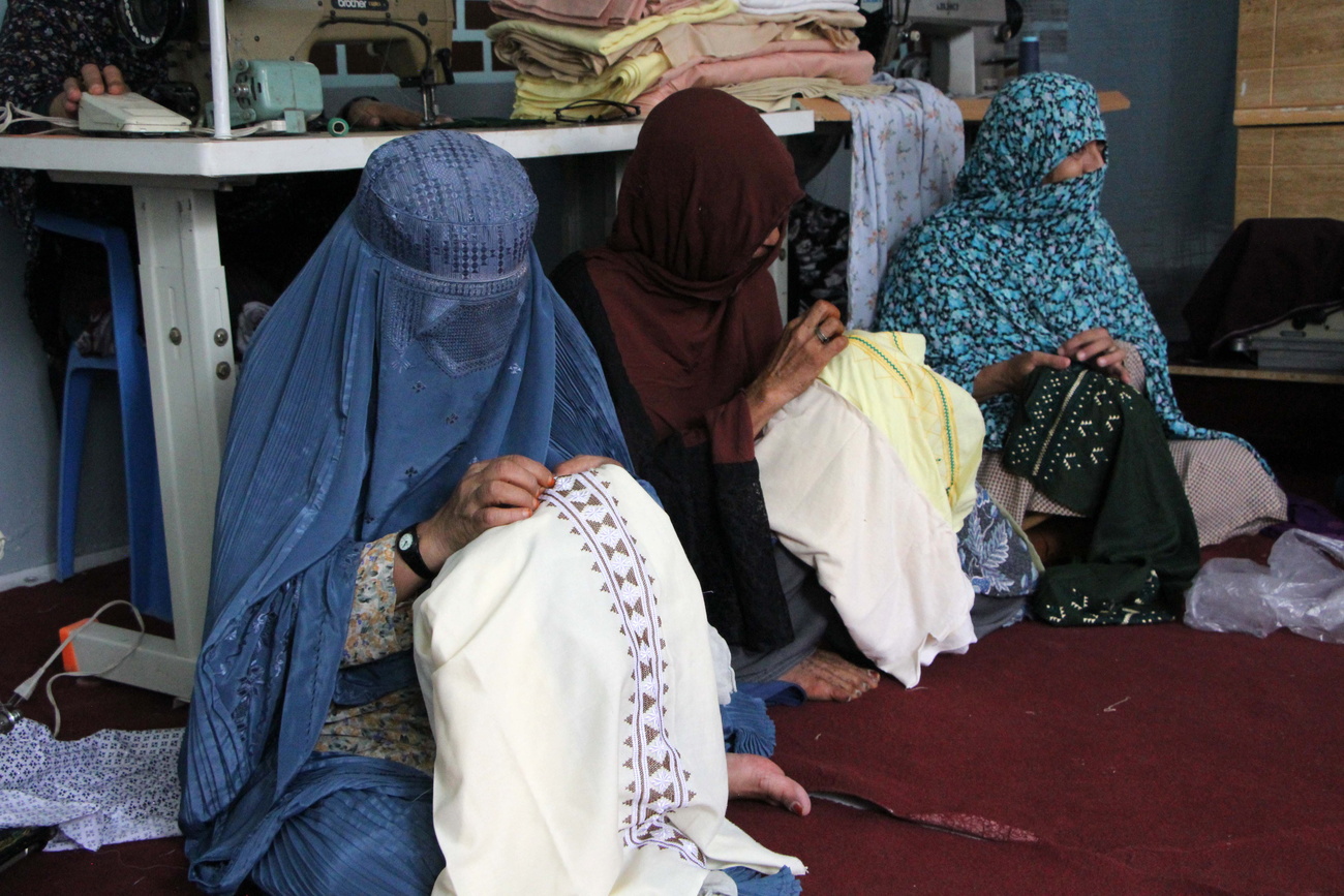 Afghan women stitch clothes at a workshop in Kandahar, Afghanistan, 04 September 2024.