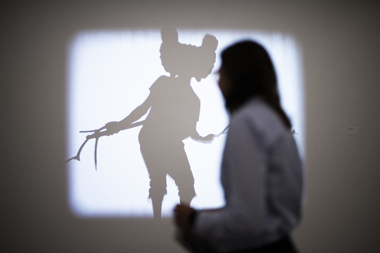 woman looking at shadowy figure