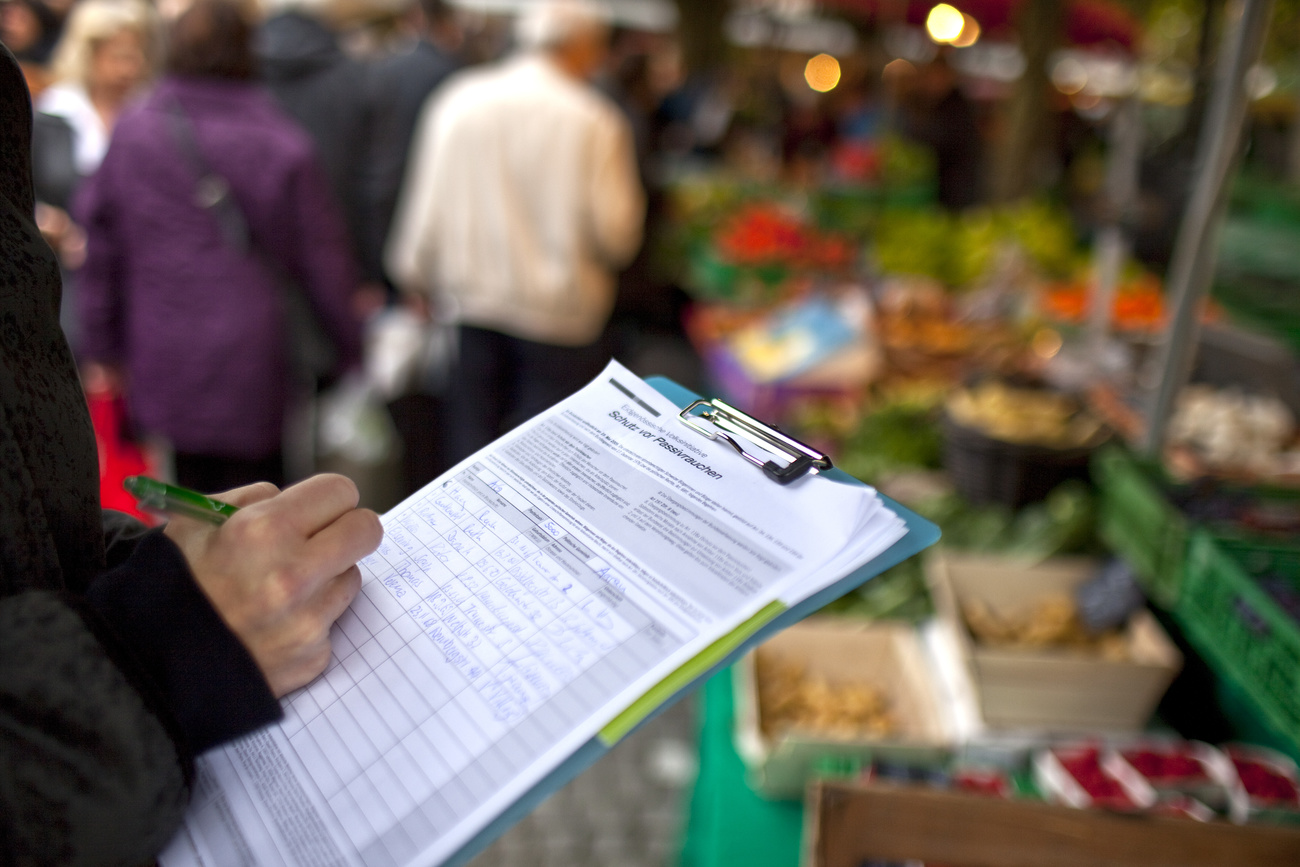 Man collecting signatures.