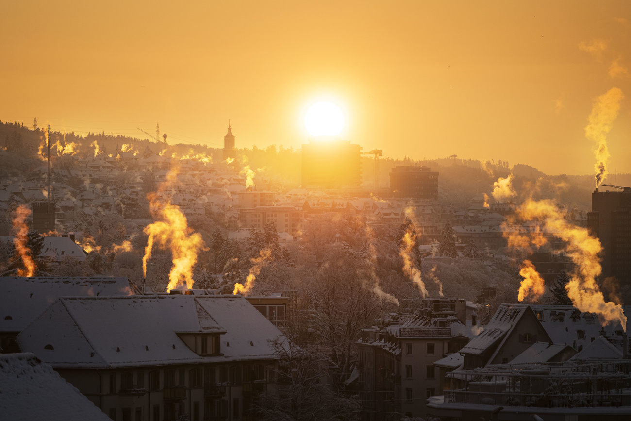 View of smoking chimneys in Switzerland.