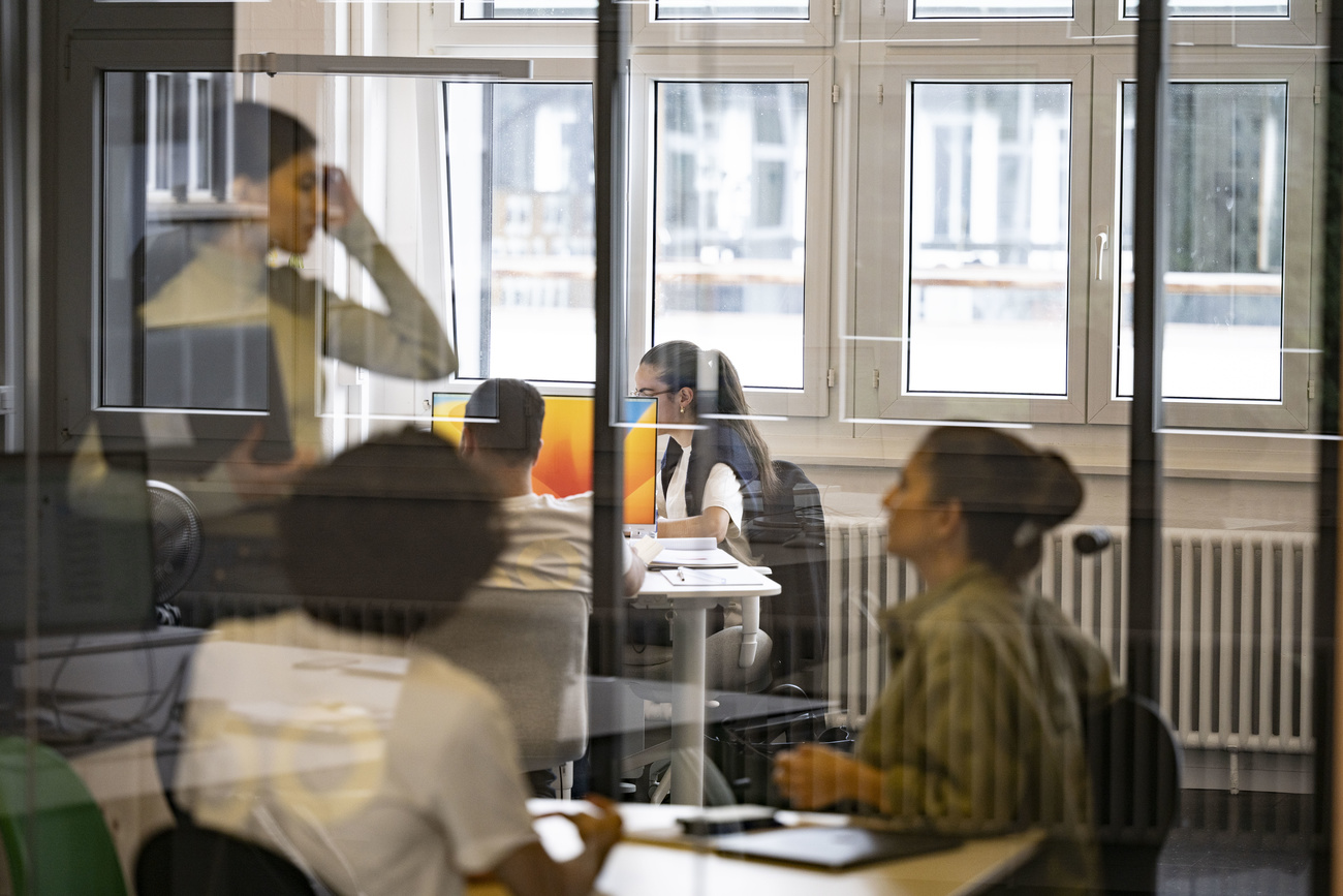 people working in an office building