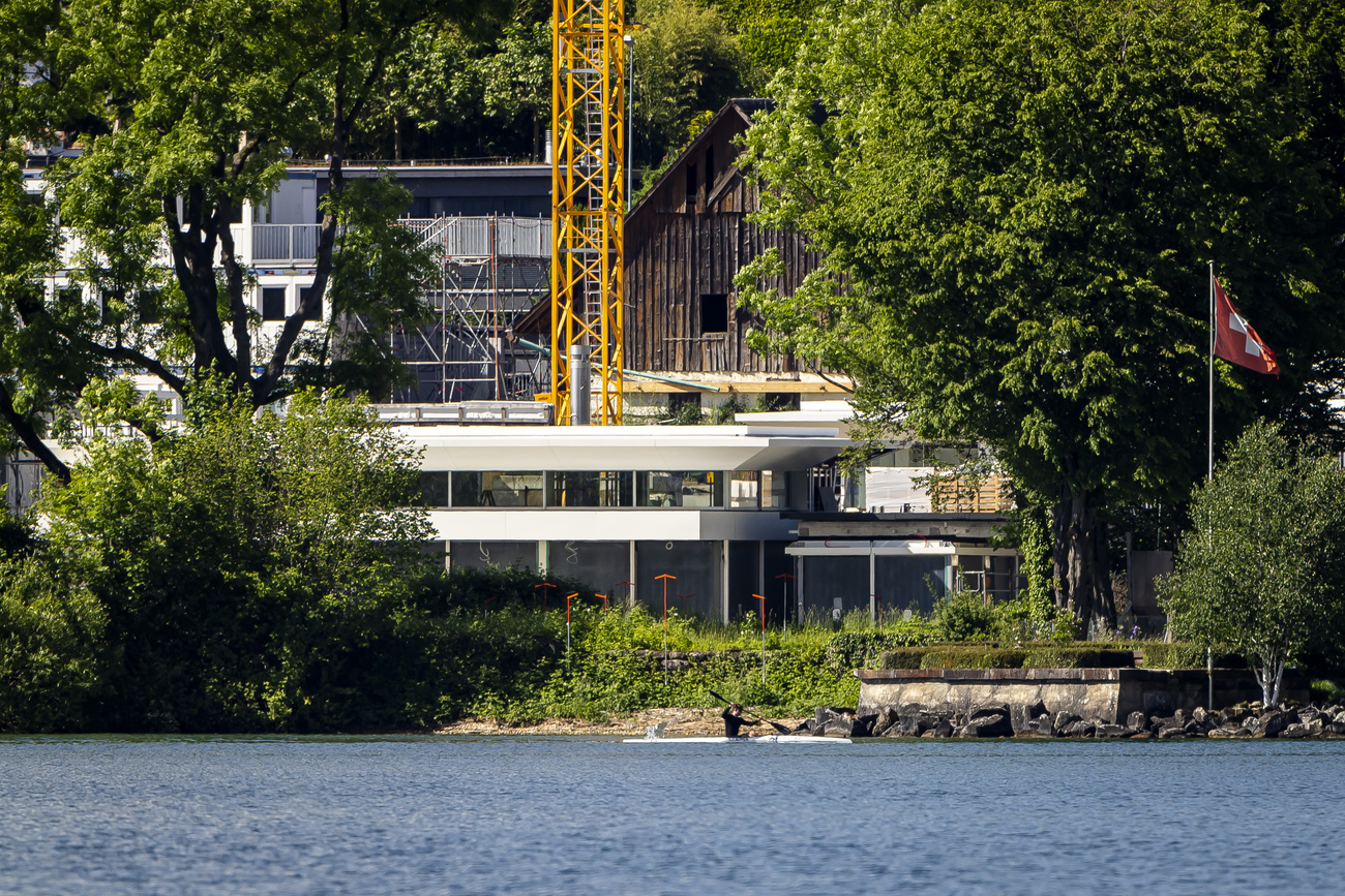 boat house on the lake with constructions poles