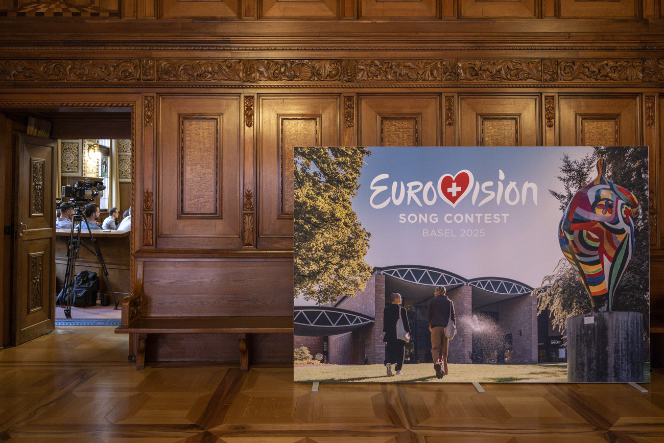 a poster of Eurovision 2025 in the Swiss federal palace