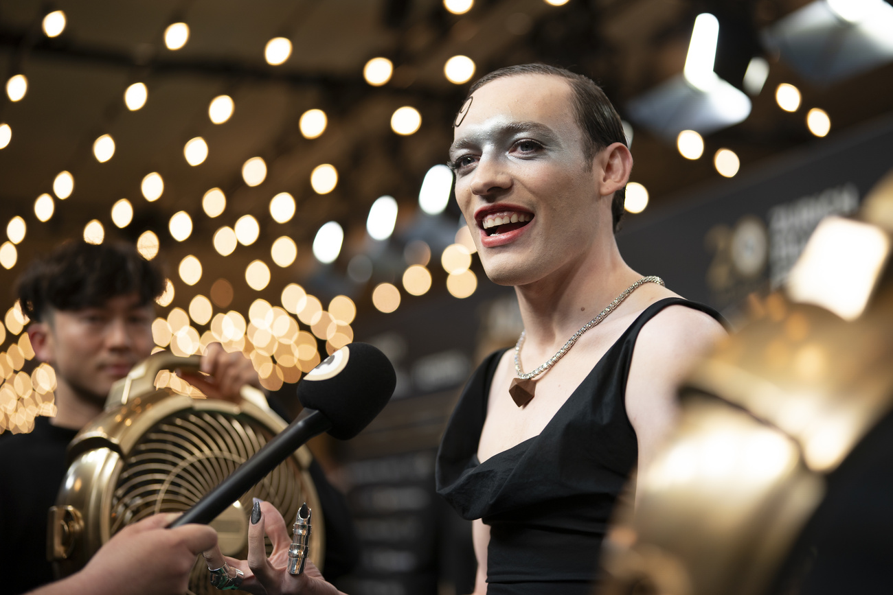 Singer Nemo Mettler arrives on the Green Carpet at the Opening Night of the 20th Zurich Film Festival (ZFF) in Zurich, Switzerland, on Thursday, October 3, 2024. (KEYSTONE/Til Buergy)