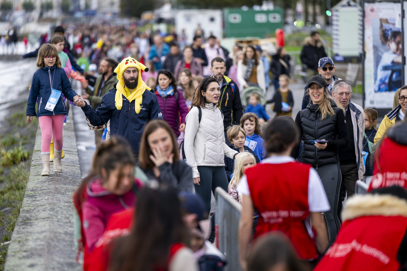 Viele Kinder mit ihren Eltern nahmen am Marsch der Hoffnung in Genf teil.