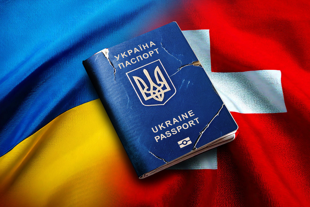 Passeport ukrainien posé sur des drapeaux suisse et ukrainien