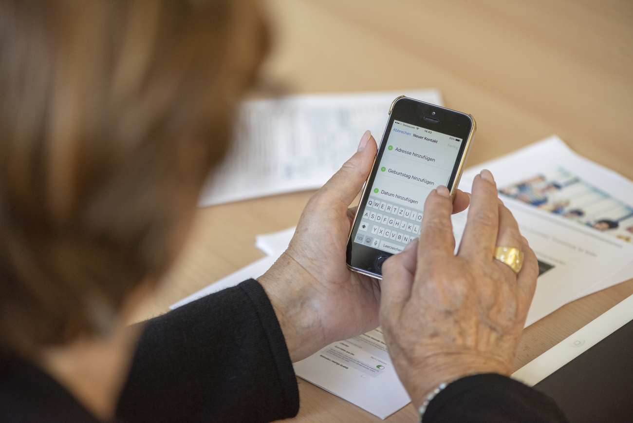 Woman holding smart phone